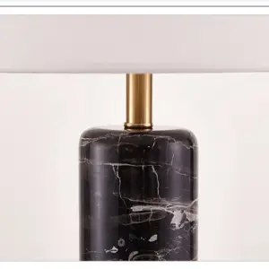 | مصباح جانبي شيك من الرخام الاسود الاسبانى