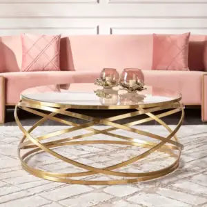 | طاولة قهوة دائرية بتصميم ملتف وسطح زجاجي