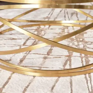 | طاولة قهوة دائرية بتصميم ملتف وسطح زجاجي