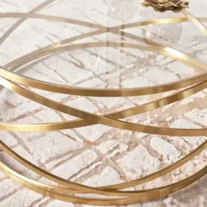 | طاولة قهوة دائرية بتصميم ملتف وسطح زجاجي