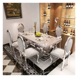 طاولة طعام رخام – تصميم عصري فاخر بسطح مقاوم للخدوش – تتسع لـ6 أشخاص – قاعدة معدنية ذهبية 7 طاولة طعام رخام بتصميم فاخرة