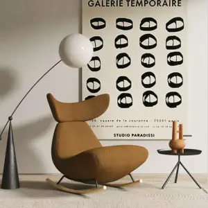 كرسي هزاز علي شكل سمكة مع مسند قدم