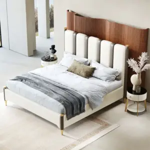 سرير من الجلد الفاخر بارجل ذهبية