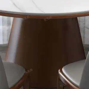 | طاولة طعام دائرية رخامية مع كراسي فخمة