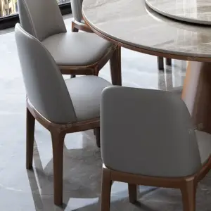 | طاولة طعام دائرية رخامية مع كراسي فخمة