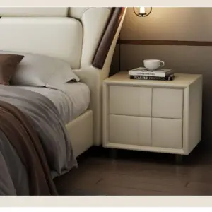 سرير نوم من جلد مع كمودينة