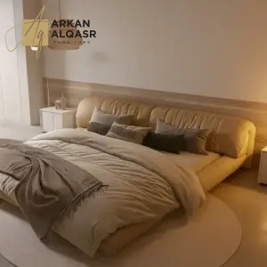سرير غرفة نوم مع كمودينة بتصميم مميز